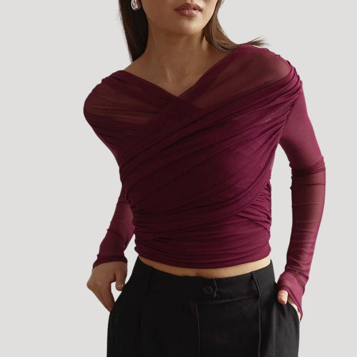 Versatile sheer wrap long-sleeve top for women, embodying light and elegant spring fashion.