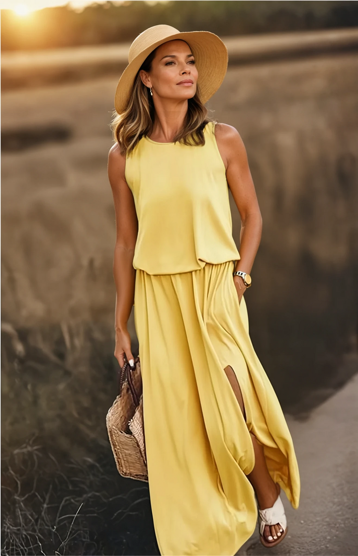 Flowy casual sleeveless summer maxi dress for women, perfect for beach or vacation.