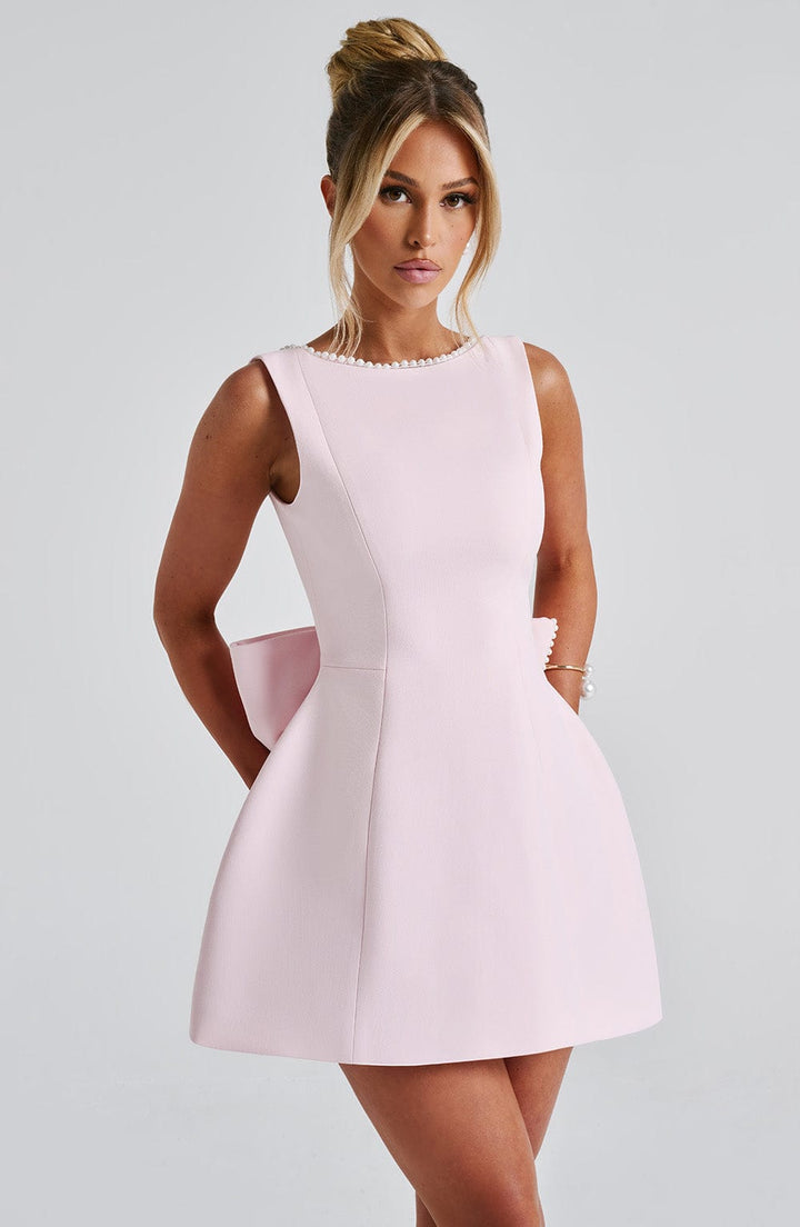 Women's tailored black mini dress, perfect formal occasionwear with a structured silhouette.