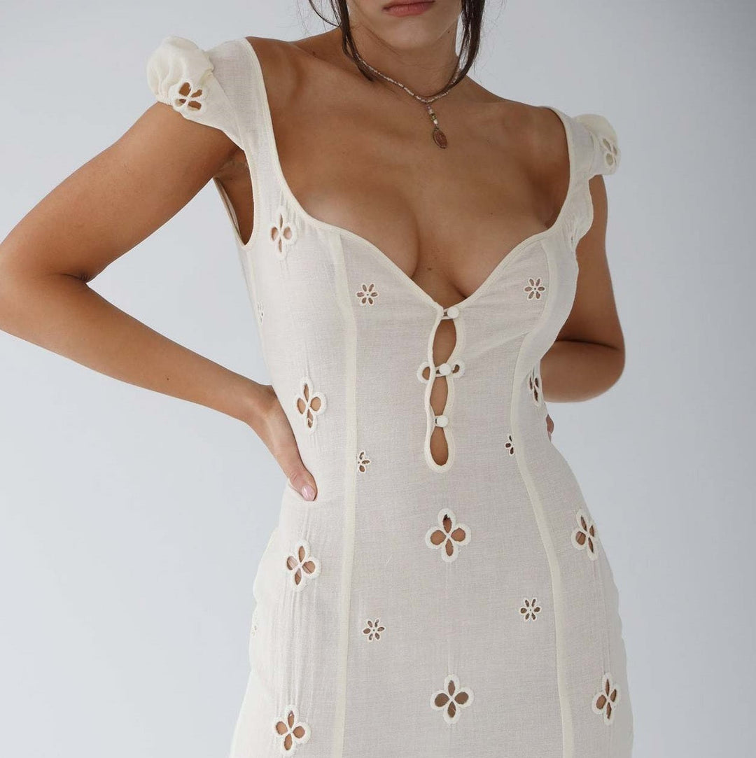 Elegant white midi dress for women, perfect as a wedding guest or for formal evening events.