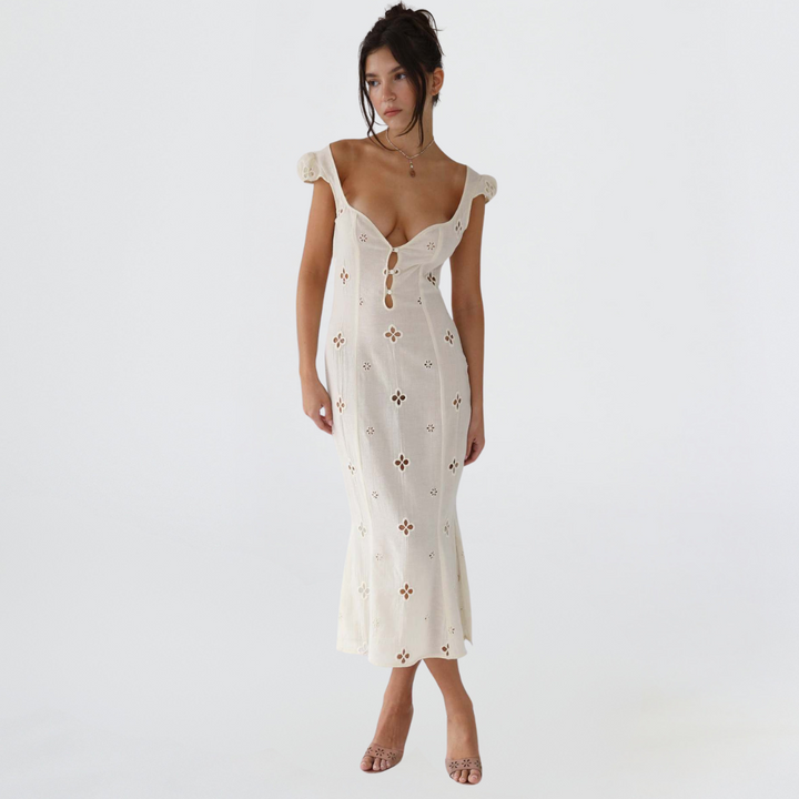 Women's timeless white midi dress, ideal for special occasions and elegant evening wear.