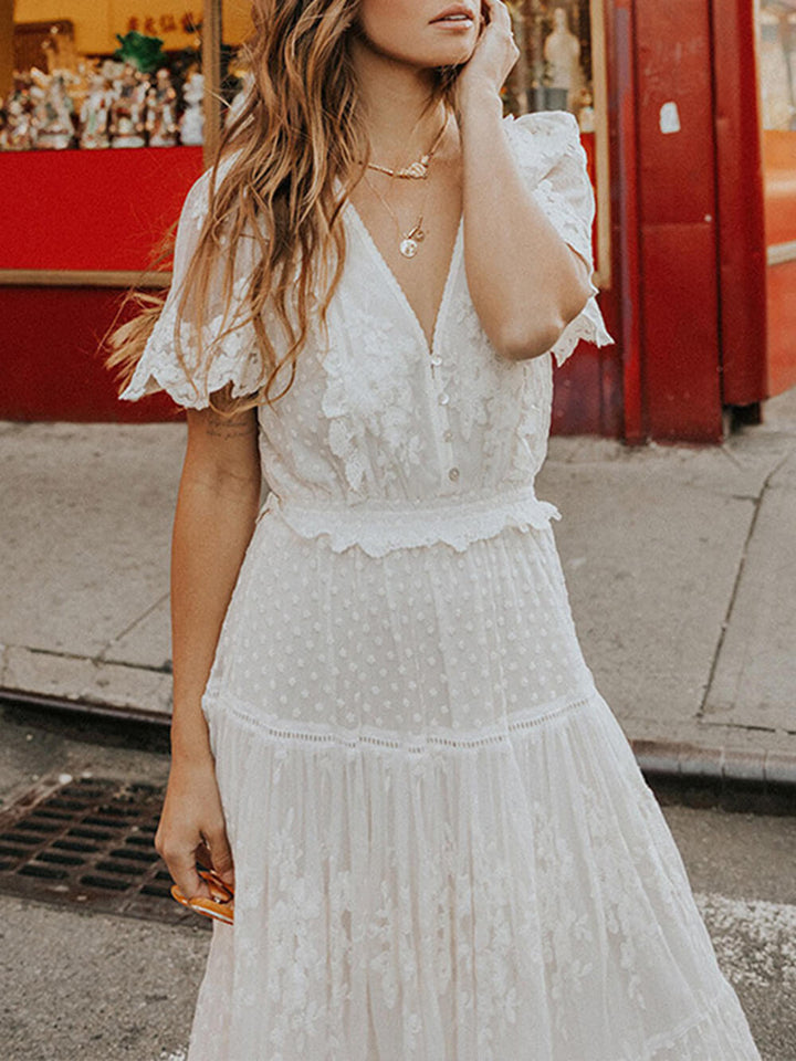 White elegant women's V-neck A-line midi dress, short sleeve, flowing for a comfortable and stylish summer look.