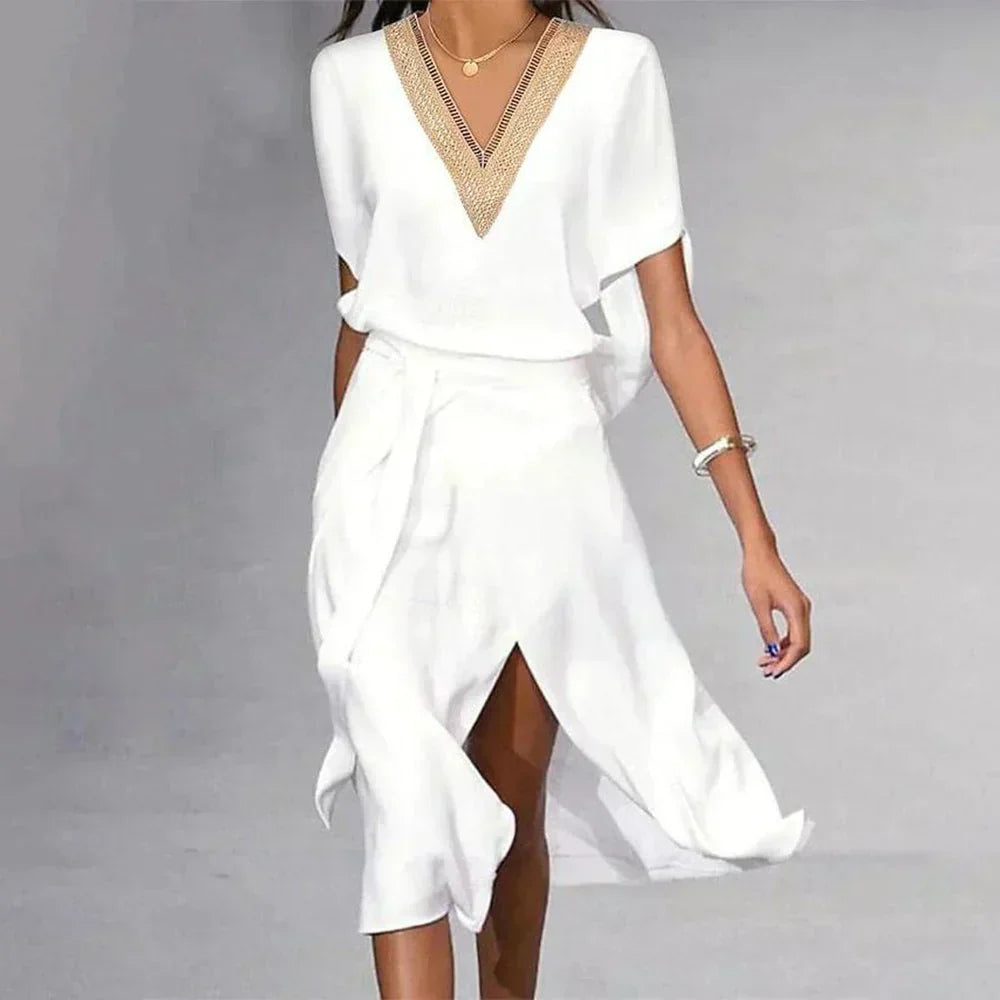 Elegant white V-neck wrap midi dress for women, versatile for casual or stylish occasions.