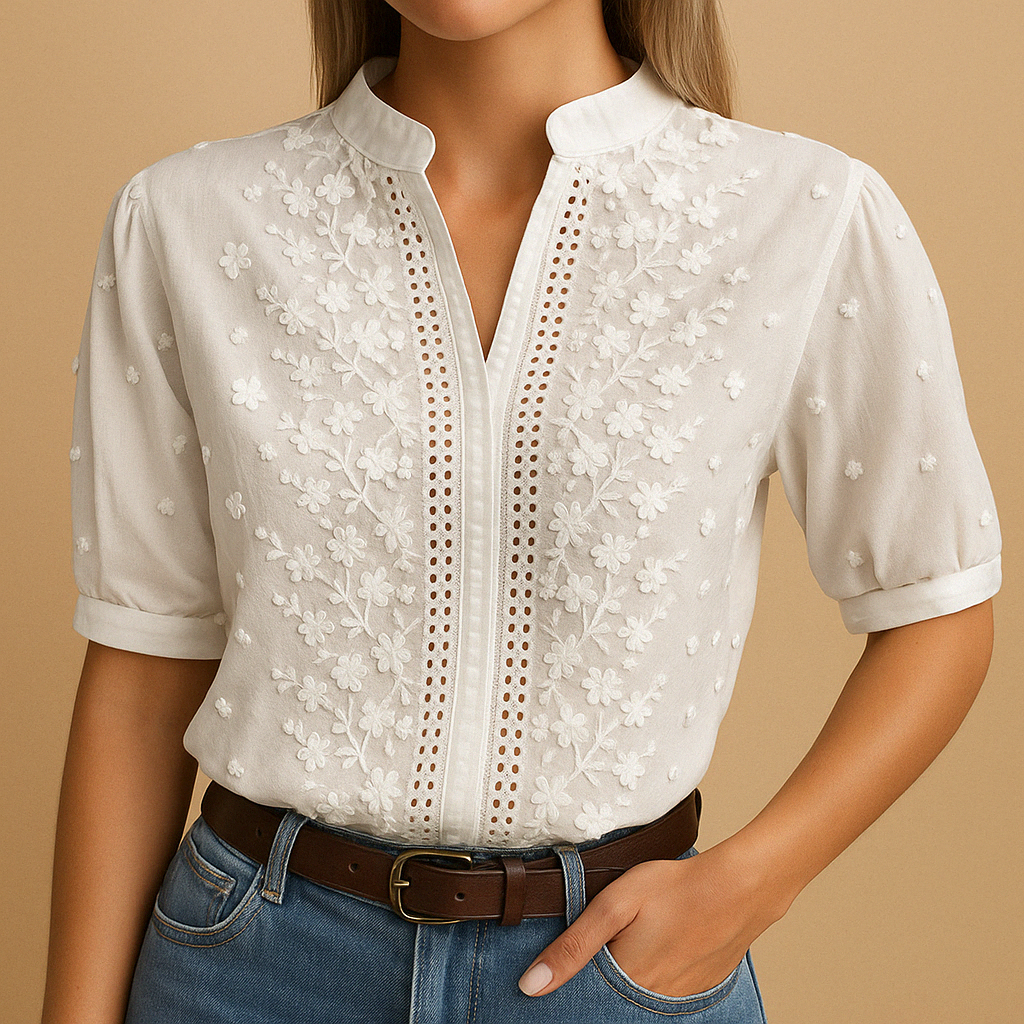 White button-up blouse for women, featuring a classic collar. Ideal for professional wear & sophisticated ladies fashion.