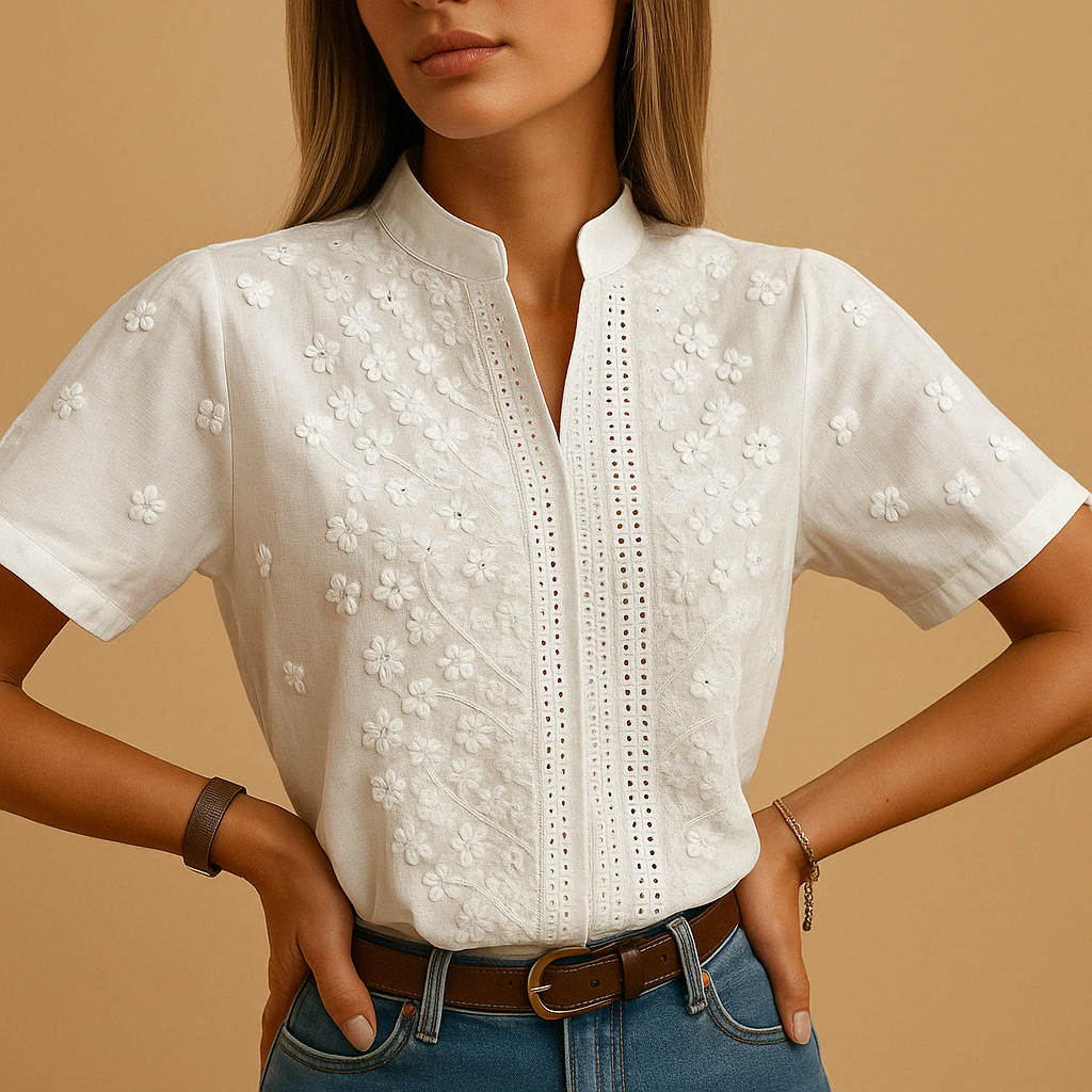 Timeless white women's blouse with classic collar. A versatile elegant shirt for professional and casual chic styles.