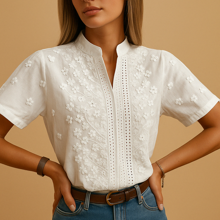 Timeless white women's blouse with classic collar. A versatile elegant shirt for professional and casual chic styles.