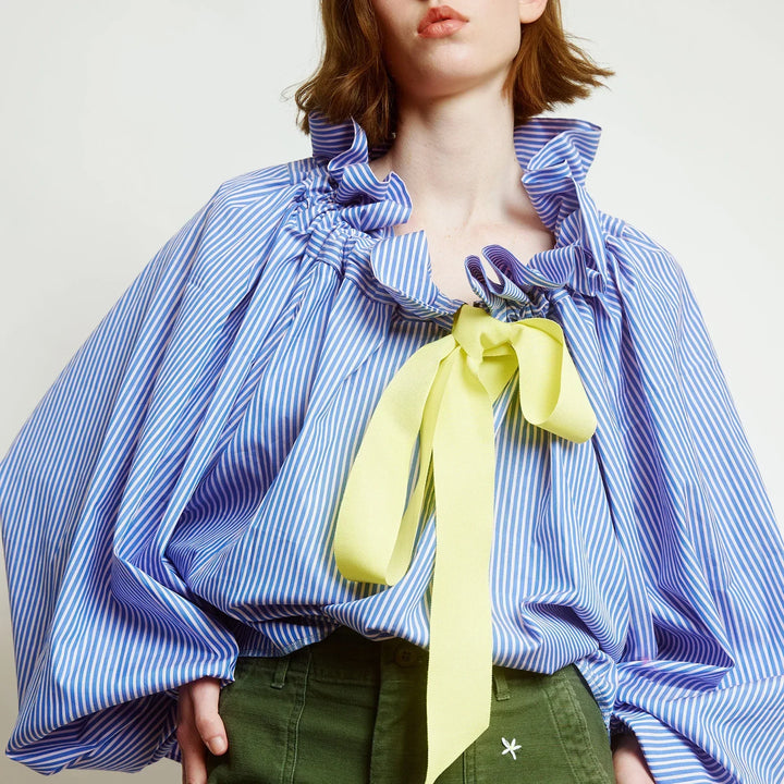 Stylish women's cotton blend blouse, white, with elegant puffed lantern sleeves and a bow tie neck.