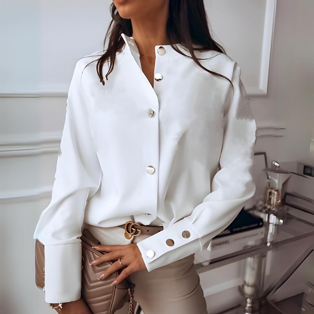 Elegant white women's long-sleeved button-front shirt for versatile everyday wear; classic and chic spring/fall fashion.
