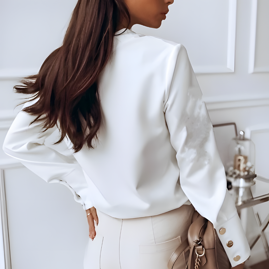 White long-sleeve women's button-front shirt; casual yet elegant top perfect for spring, fall, and everyday versatile style.