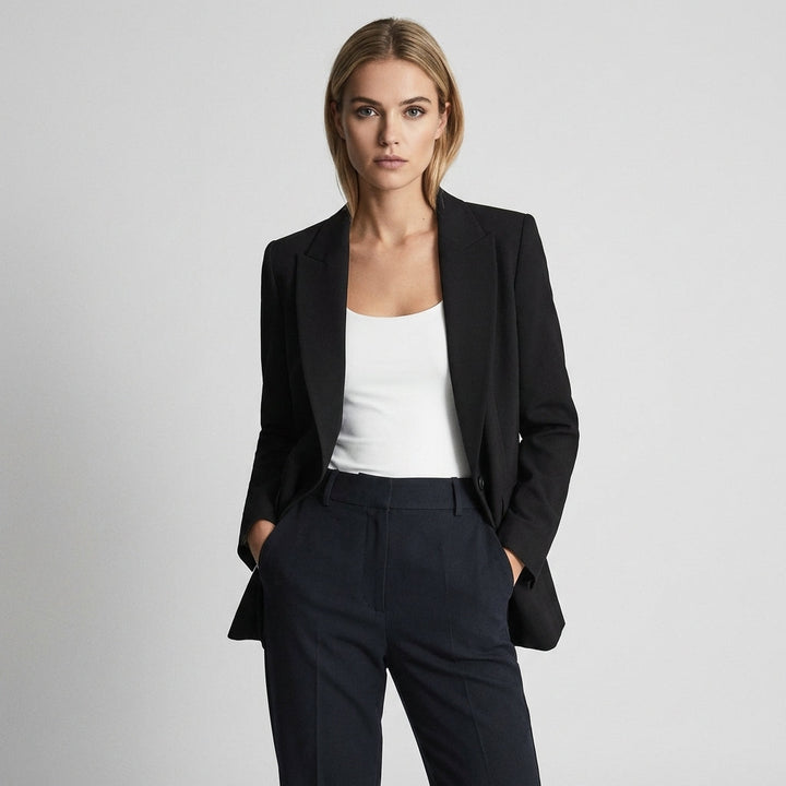 Elegant women's 2-piece suit set: tailored blazer & trousers for professional business attire & office wear.