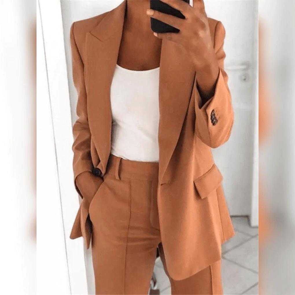 Sophisticated women's business suit, a tailored blazer and sleek trousers for professional and formal wear.