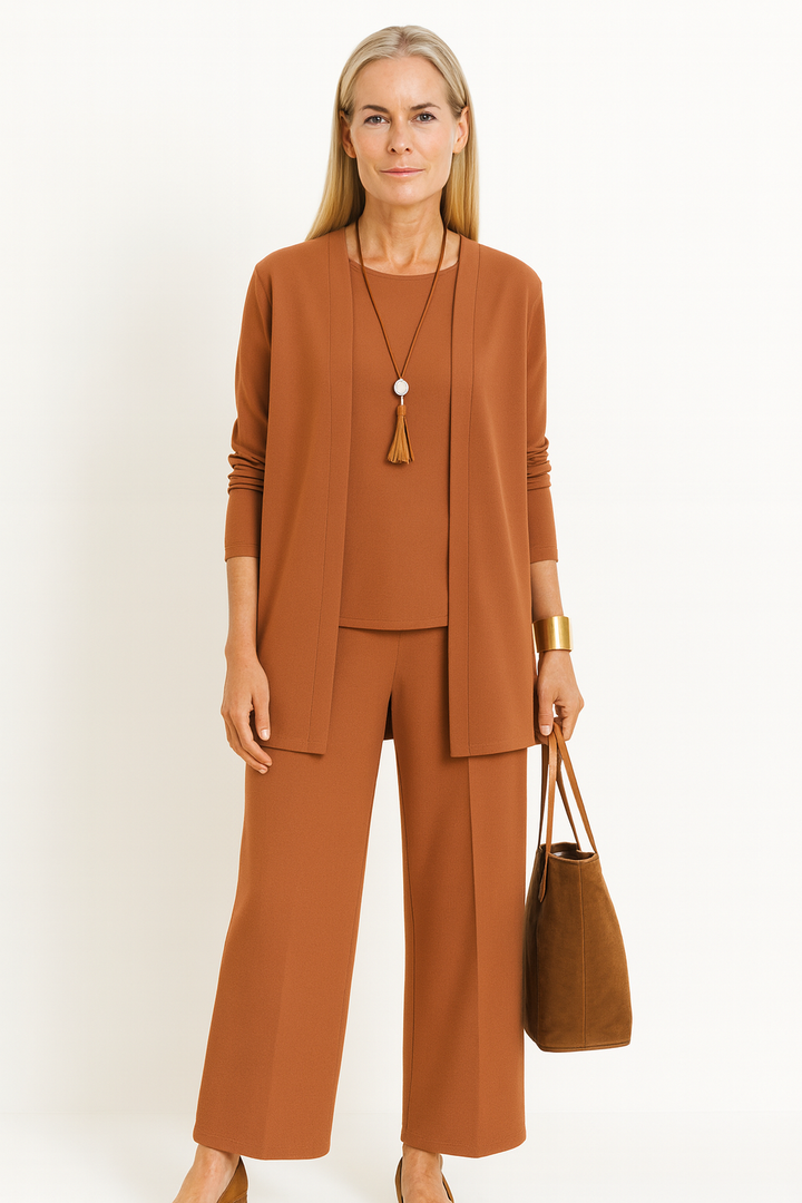 Chic women's 3-piece pantsuit. Elegant business casual attire for versatile fashion.