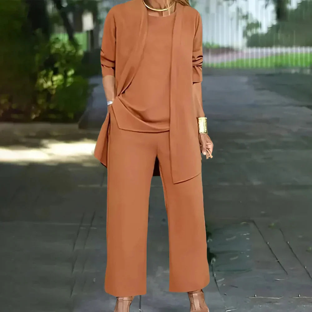 Chic women's 3-piece pantsuit featuring a sharp tailored blazer, stylish vest, and classic trousers for women.