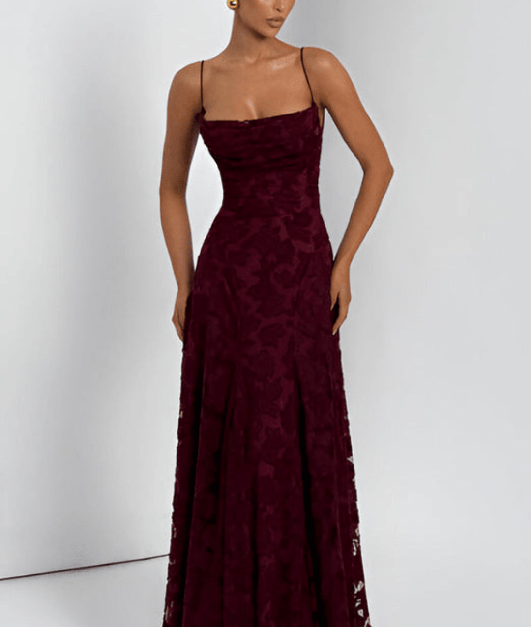 Elegant women's A-line maxi dress with spaghetti straps. Perfect for evening or formal occasions.