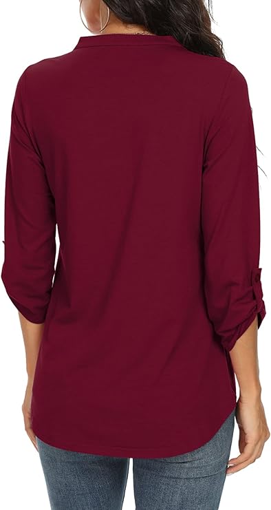 Dressy women's V-neck blouse with bell sleeves & scalloped hem, great for work or evening.
