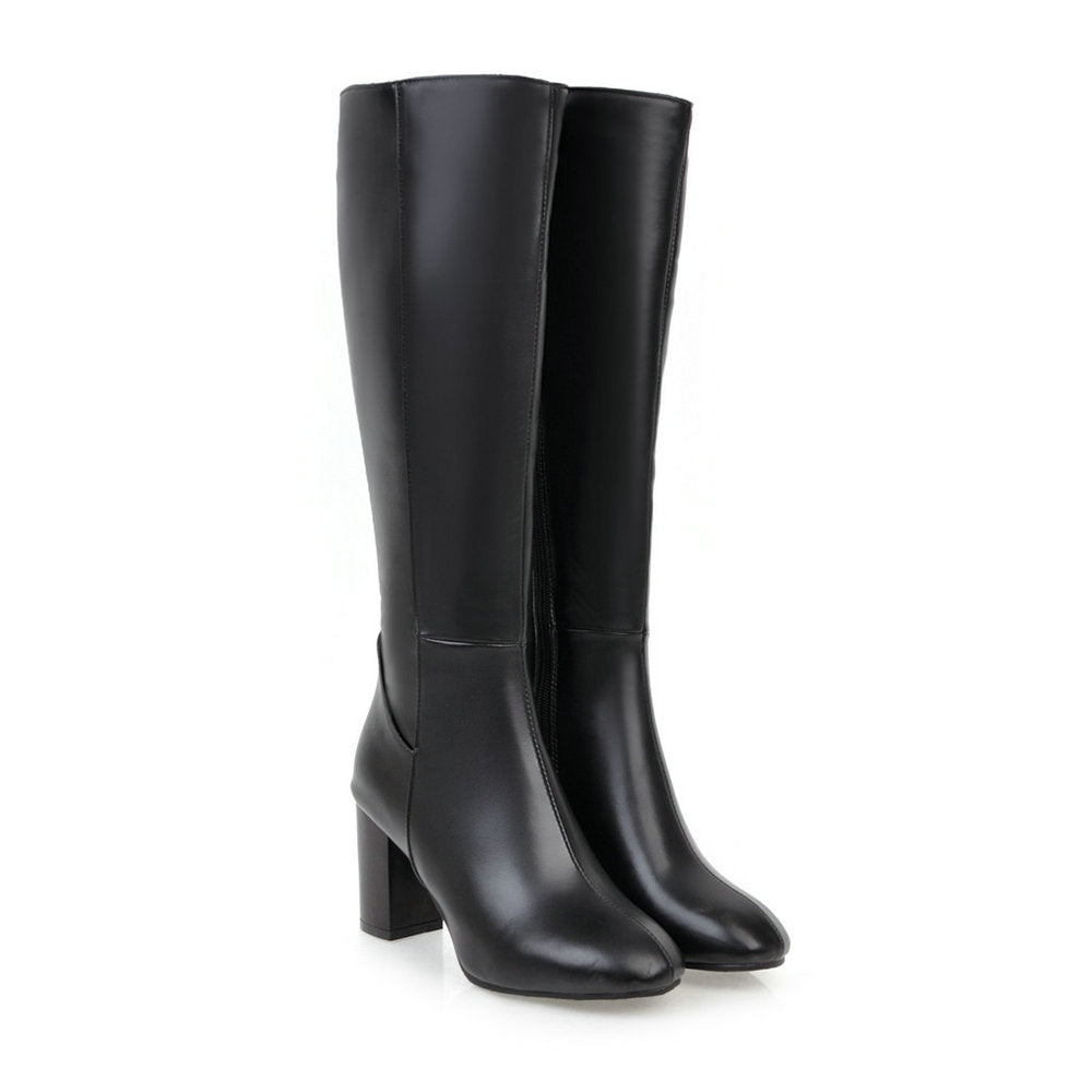 Full shot of elegant women's knee-high block heel boots, a must-have for fall fashion