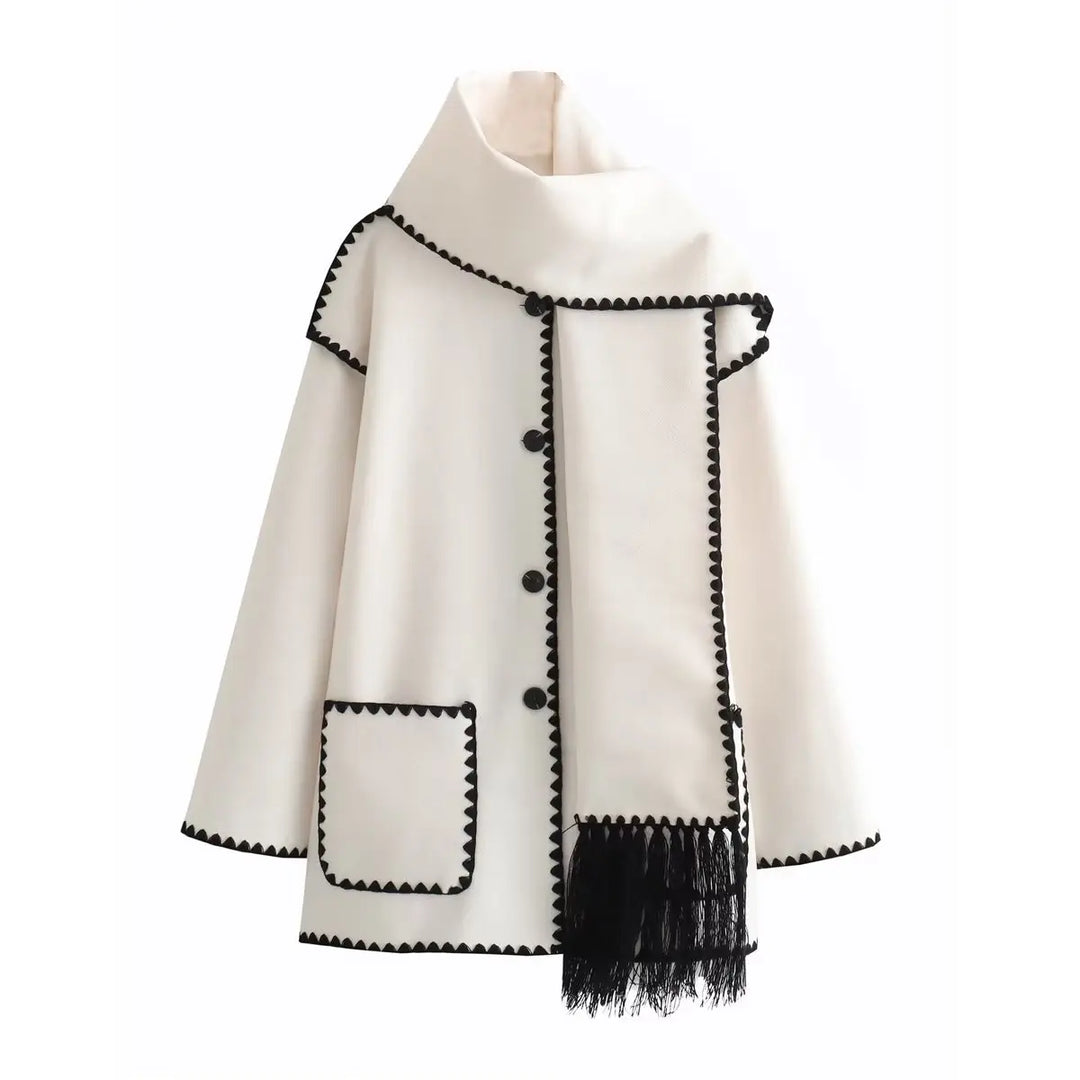Fashionable women's wool blend wrap coat in a versatile shade, accented with a unique fringe hem