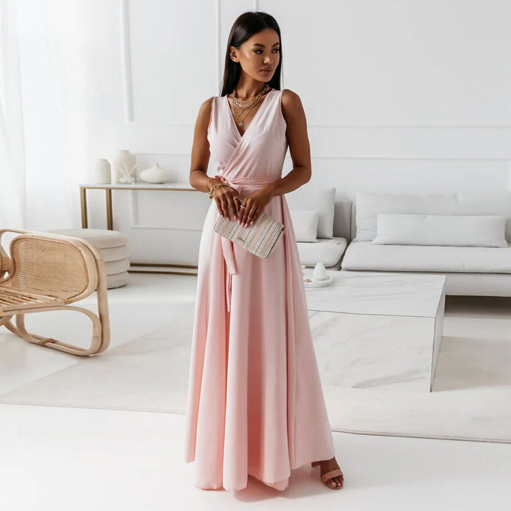 Elegant women's black wrap maxi dress with long sleeves, perfect for a wedding guest or formal evening event.
