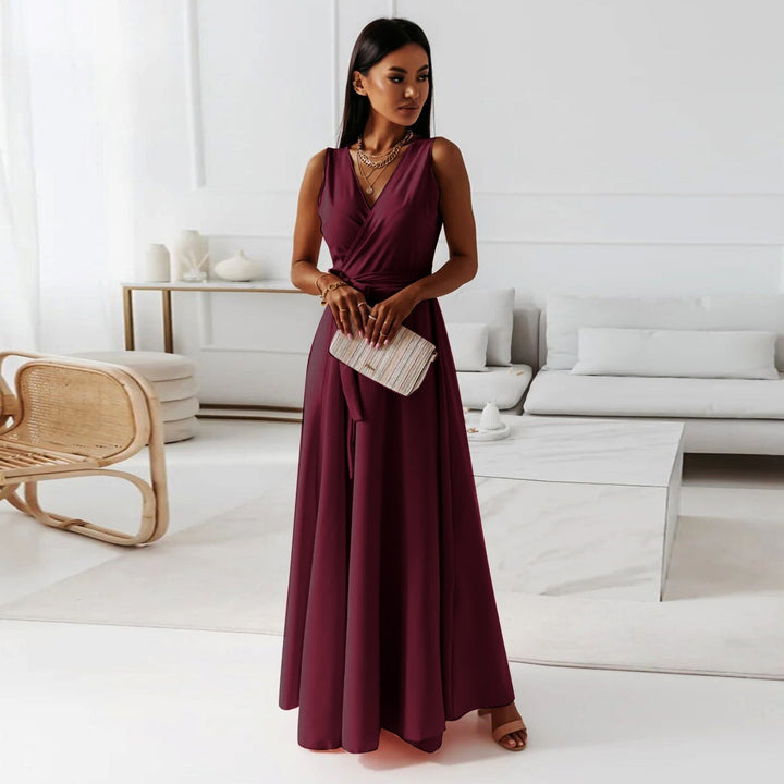 Stunning emerald green wrap maxi dress for women, featuring a flattering silhouette for wedding guests.