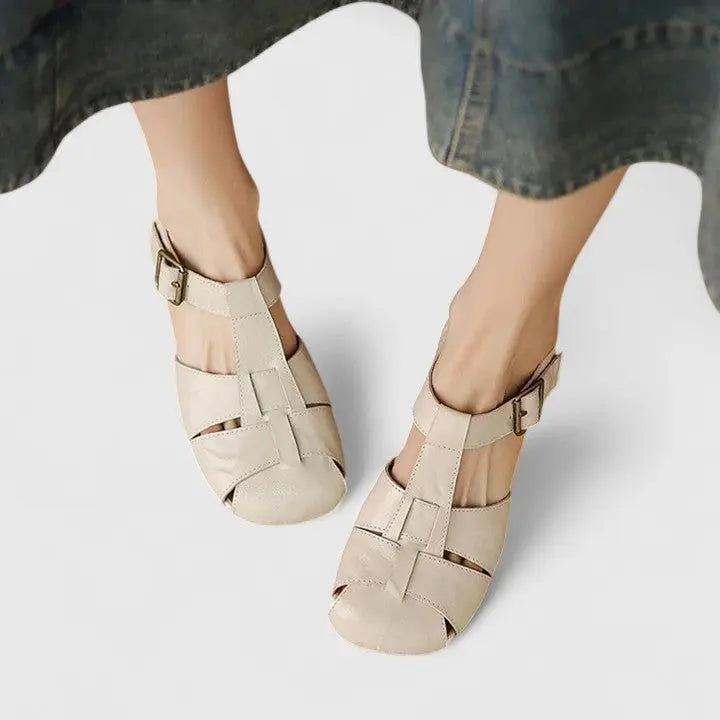 Classic women's block heel sandals in a versatile shade, providing elegant comfort for summer and day-to-night chic.
