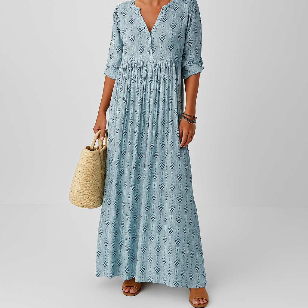 Elegant women's boho maxi dress with a vibrant print and adjustable long sleeves for a flowing, casual look.