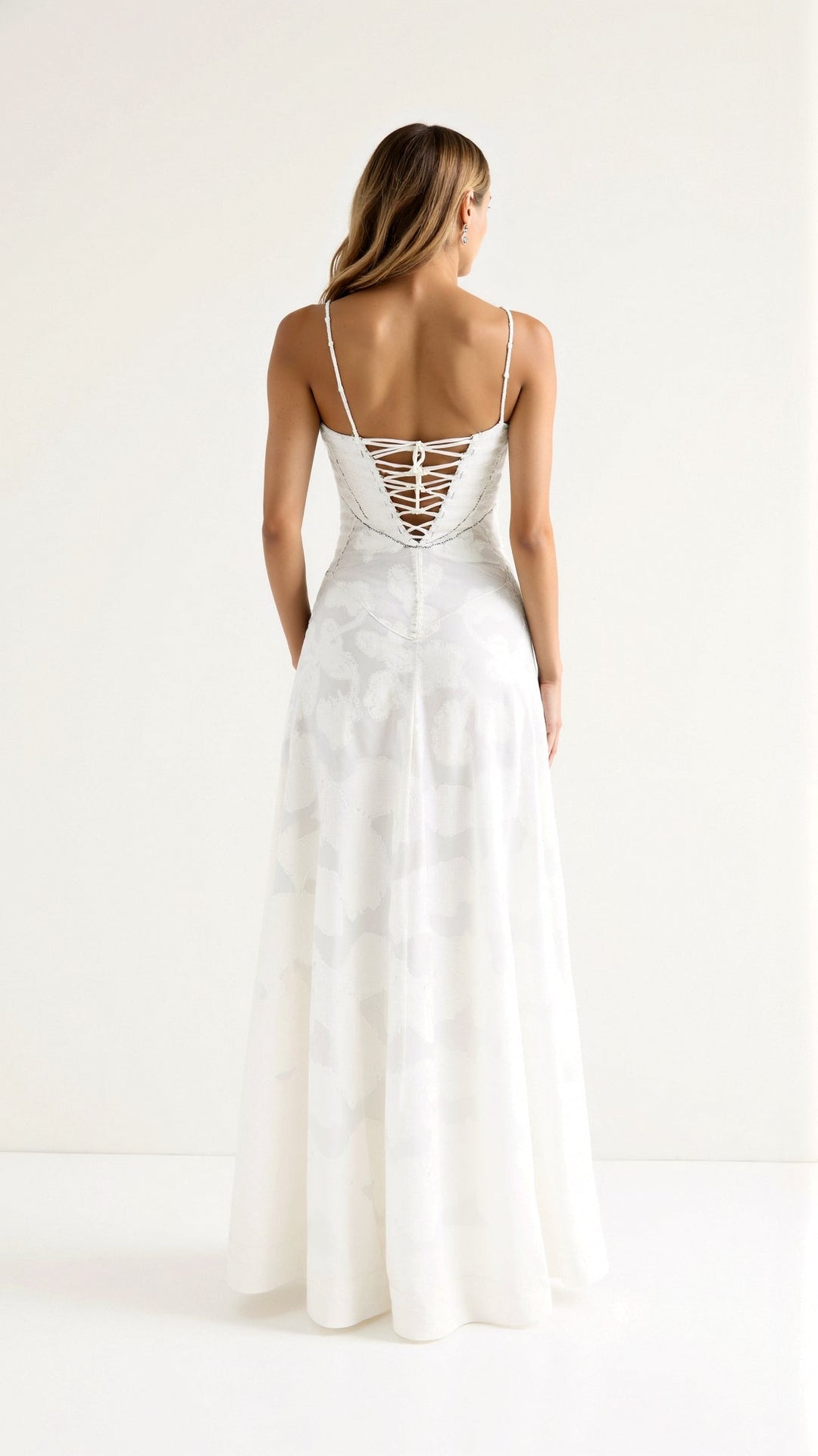 Women's long occasion dress in a rich color, styled as elegant wedding guest attire