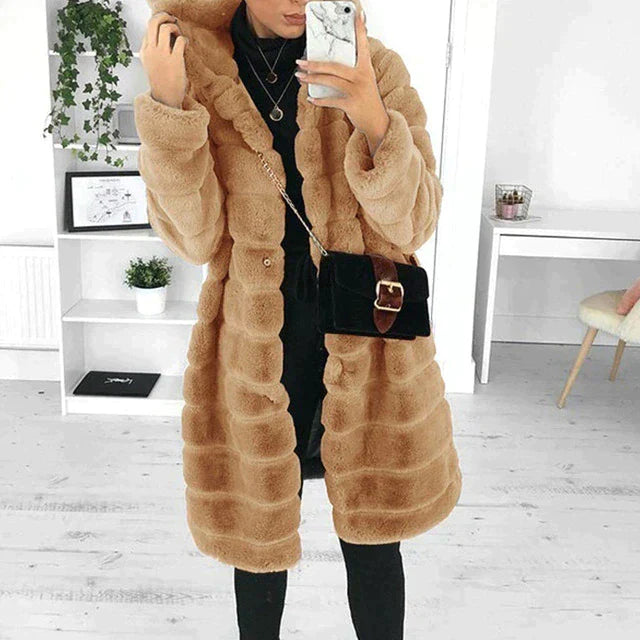 Faux fur button-down coat for women, showcasing an elegant and warm design for winter fashion.