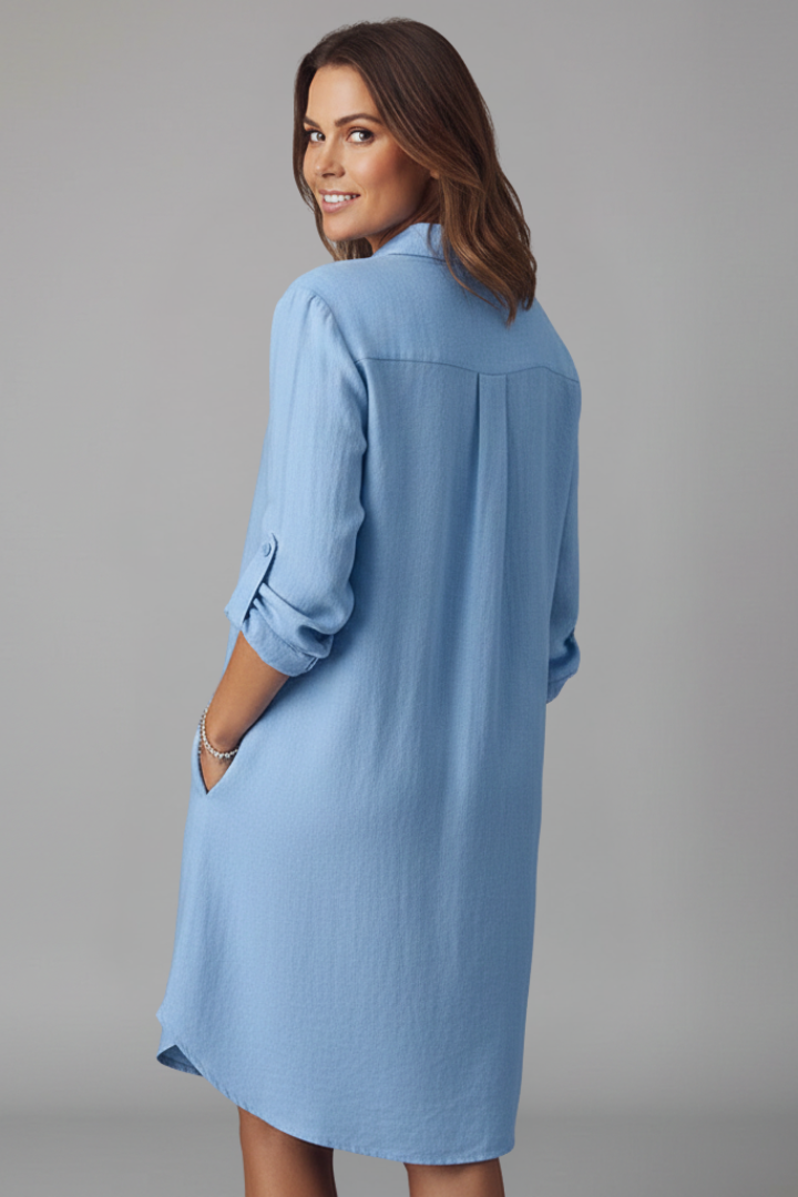 Stylish women's long-sleeve shirt dress with a full button-front, exuding casual elegance for any occasion.