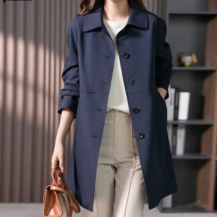 Lightweight, long trench coat for women with a stylish button-front design, suitable for casual fashion.