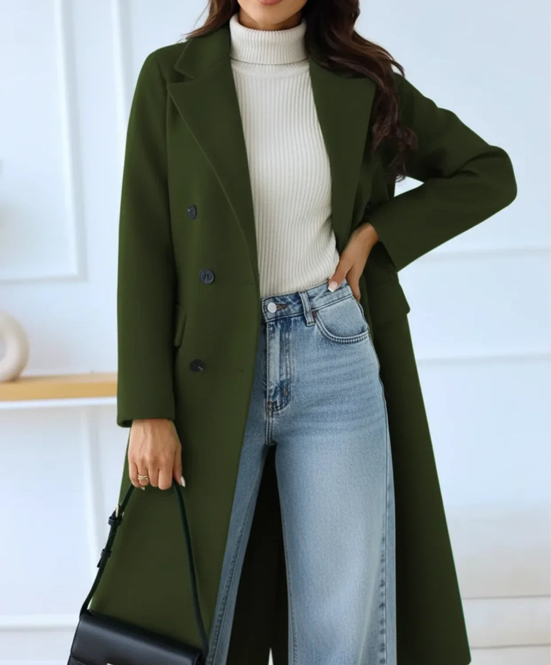 Stylish women's long brown double-breasted coat. Classic winter outerwear for an elegant look in autumn fashion.