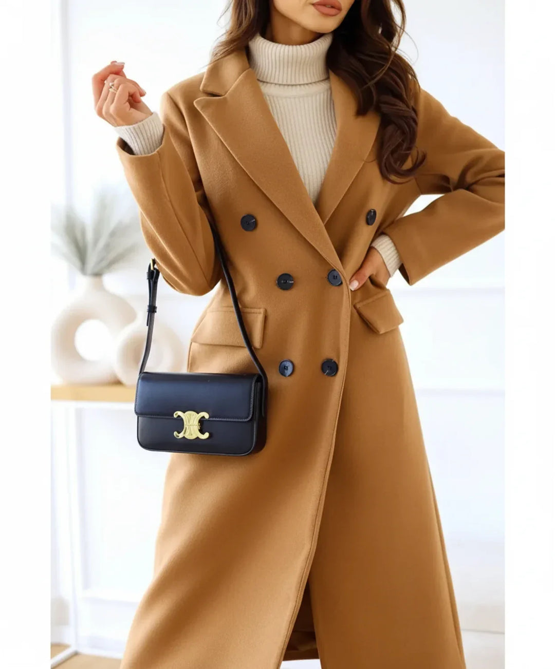 Khaki women's double-breasted long coat with a notch lapel and button closure for a classic, elegant style.