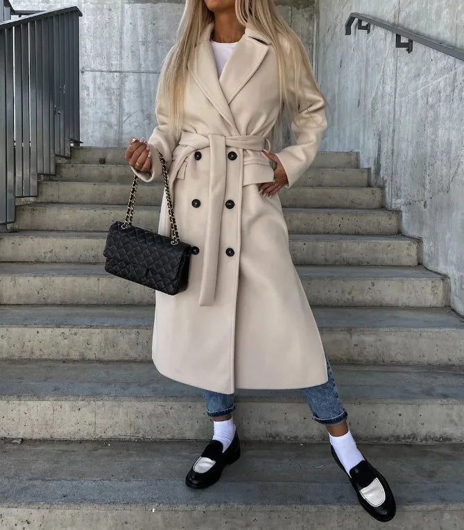 Stylish women's classic trench coat with long sleeves, a versatile piece for elegant winter fashion