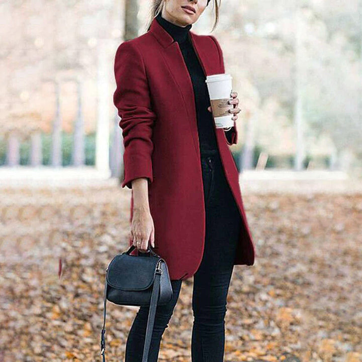 Full-length view of a women's classic tailored winter coat, highlighting its elegant and timeless design.
