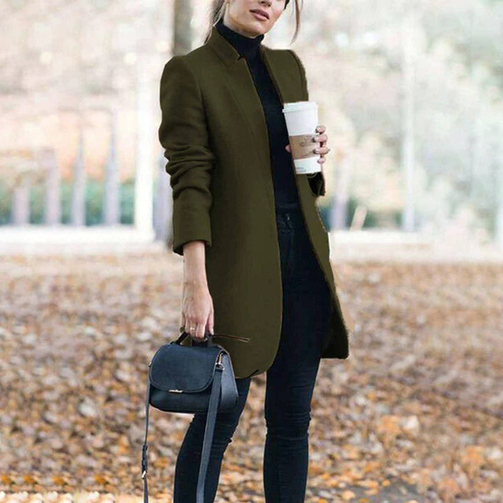 Stylish women's winter coat, tailored fit, featuring a prominent lapel for a classic outerwear look.