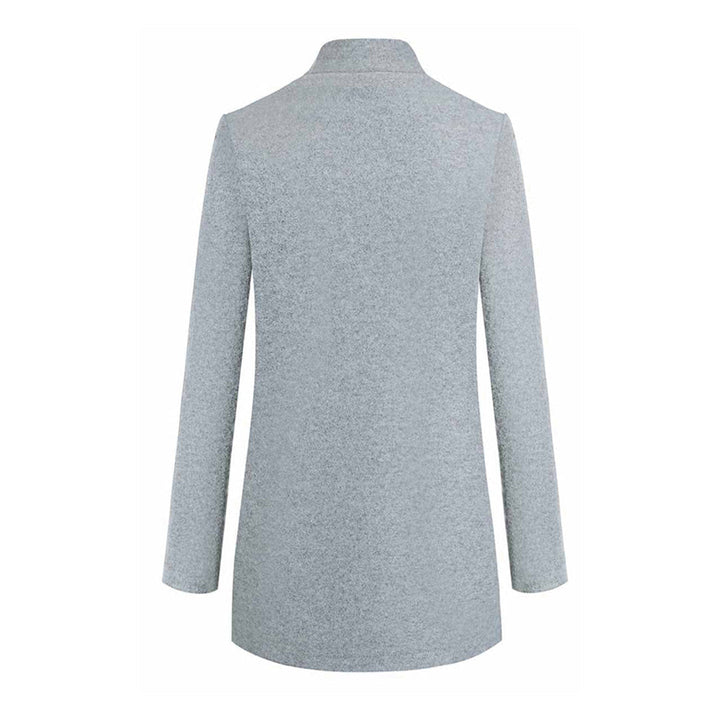 Front view of a women's elegant winter coat, tailored with a classic lapel, showcasing its fashion appeal.