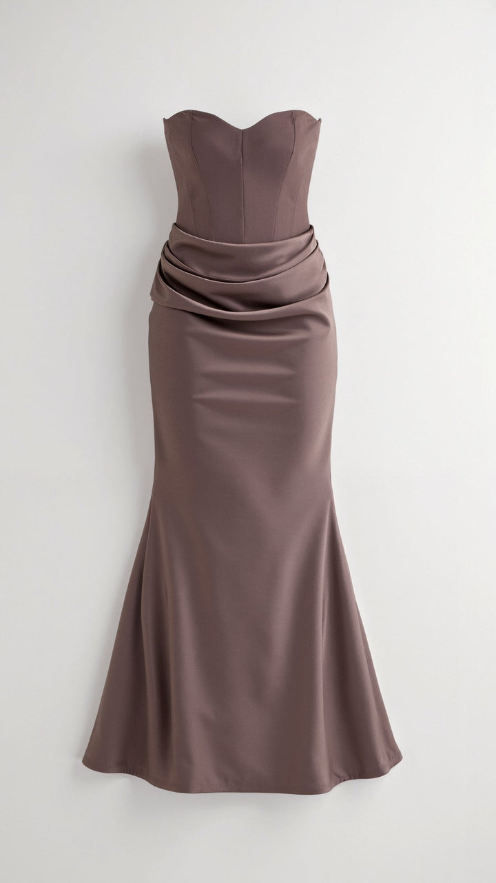 Close-up of the fabric detail on a black column maxi dress, highlighting its quality