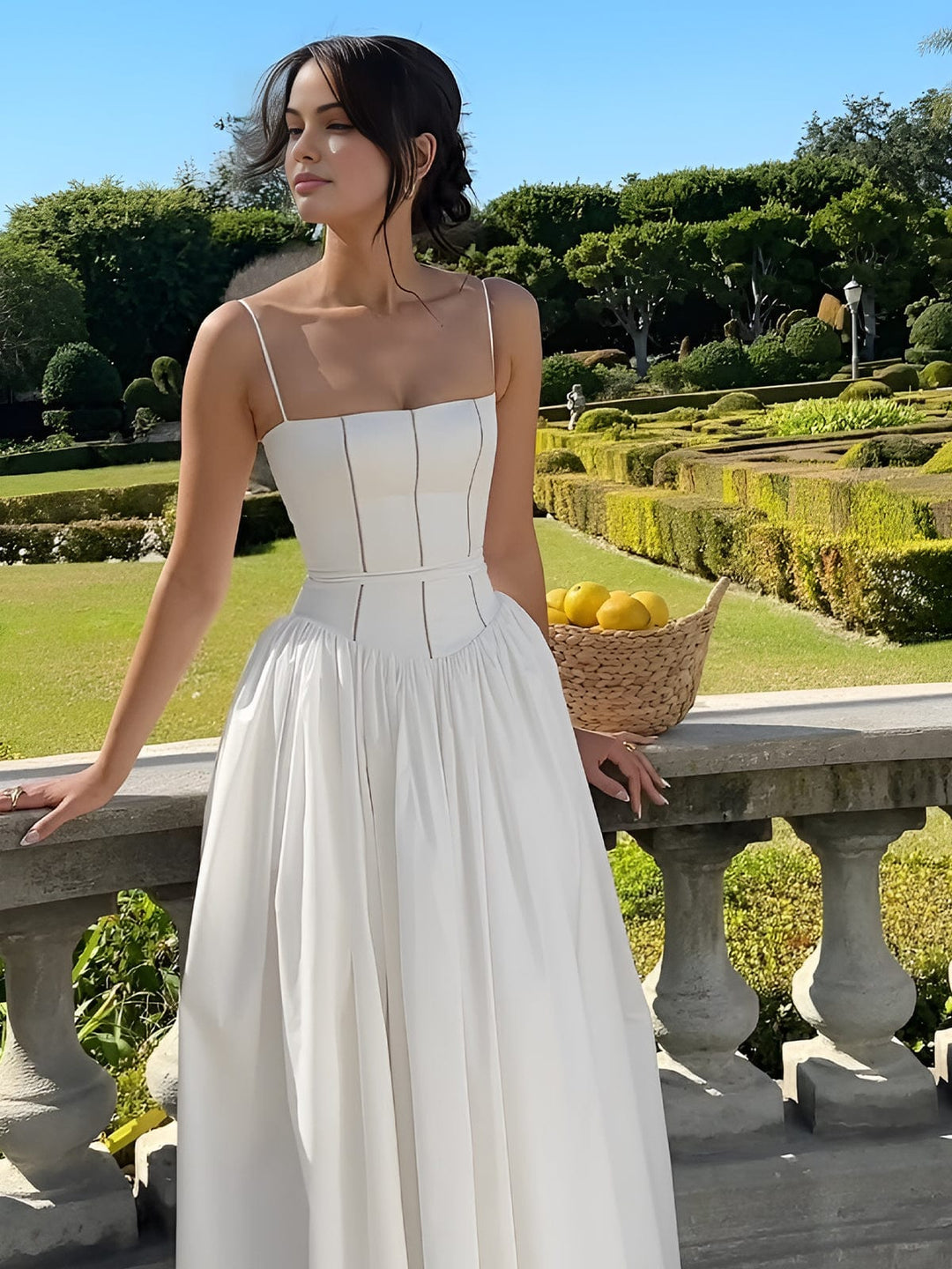Close-up of a sophisticated women's formal midi dress with corset detailing and elegant silhouette