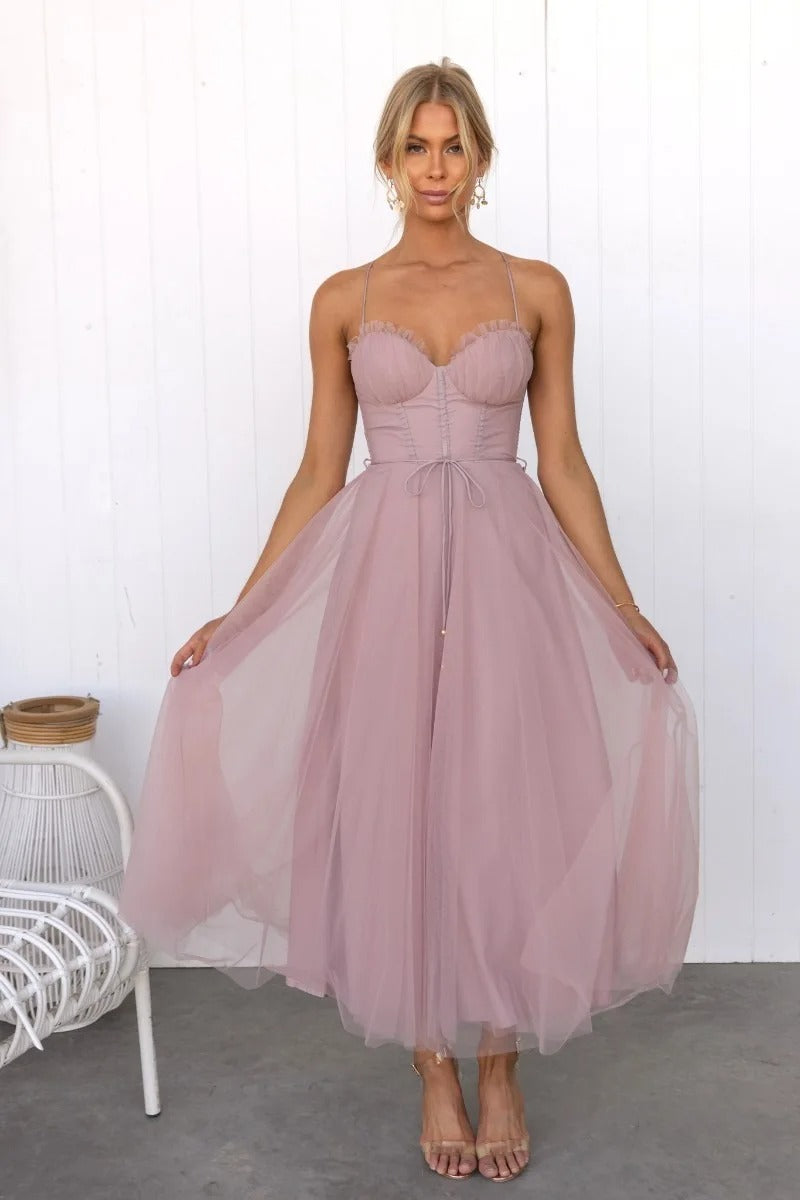 Chic women's midi corset dress for parties or cocktail events. Elegant spaghetti strap design & tailored fit.