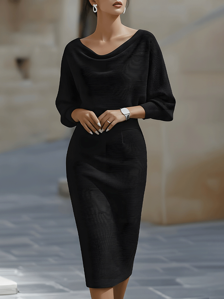 Textured shot of soft fabric on a women's elegant cowl-neck bodycon midi dress, comfortable & stylish.