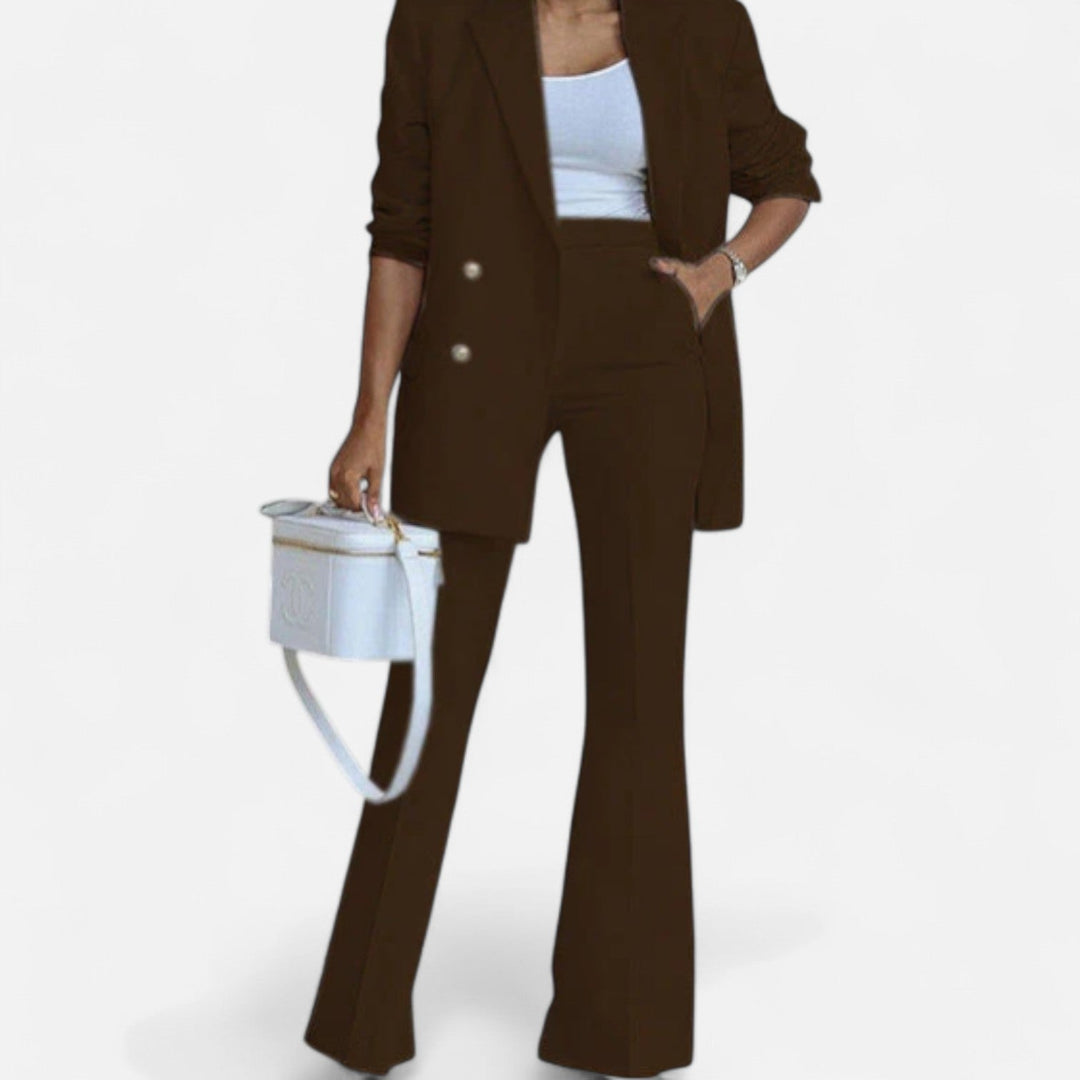 Modern women's business attire: a coordinating double-breasted blazer and trousers suit set.