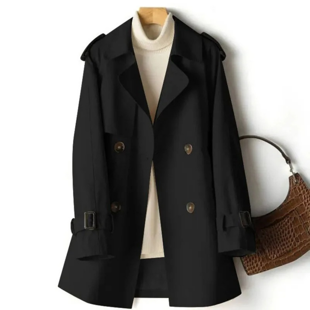 Elegant women's double-breasted coat with a belted waist, perfect for classic winter fashion.