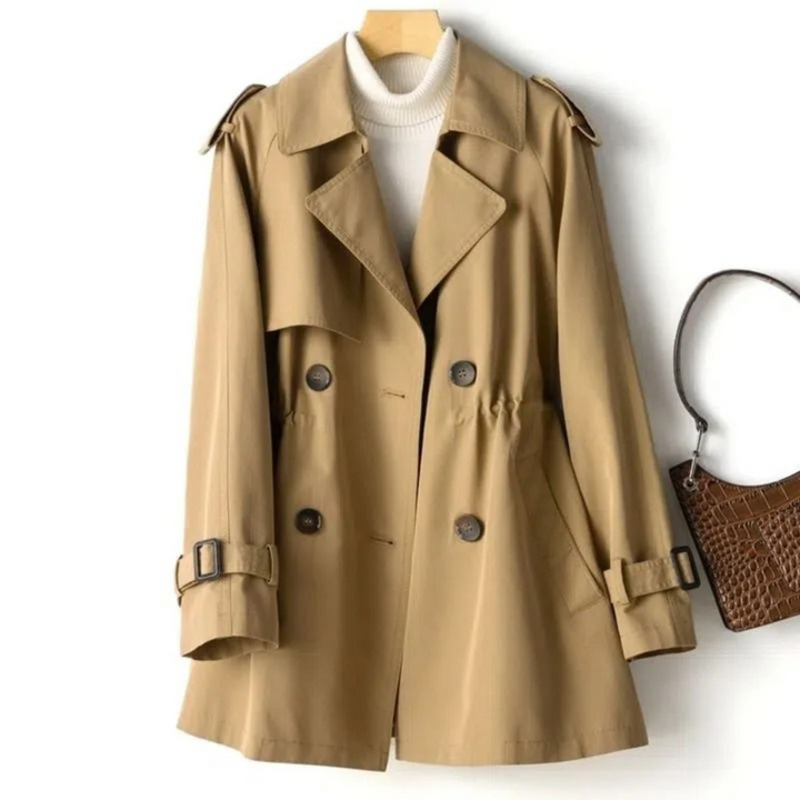 Women's sophisticated double-breasted long coat with a stylish belt, suitable for formal wear.