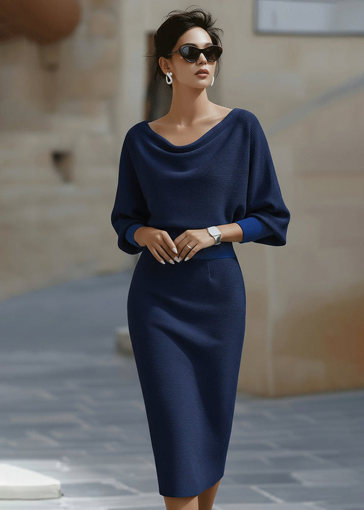 Black elegant women's midi dress, draped batwing sleeves, cowl neck. Perfect for sophisticated evening wear.