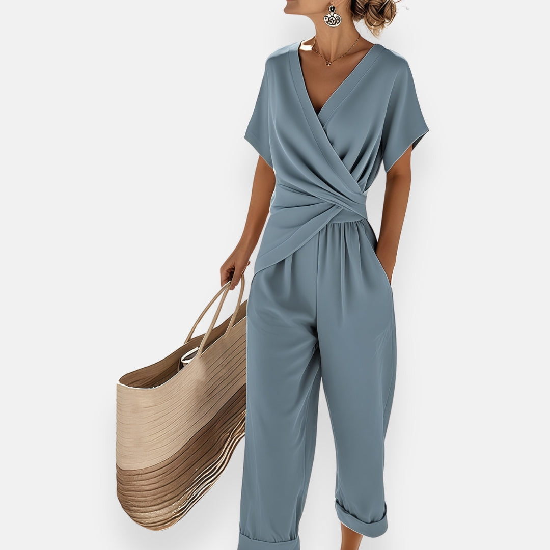Elegant women's draped bow jumpsuit. Chic and versatile one-piece, perfect for formal eveningwear & special occasions.