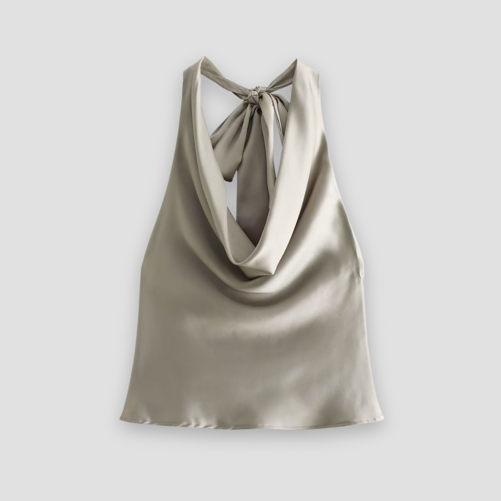 Fashionable women's satin halter top with a soft draped front; a must-have for summer elegance.