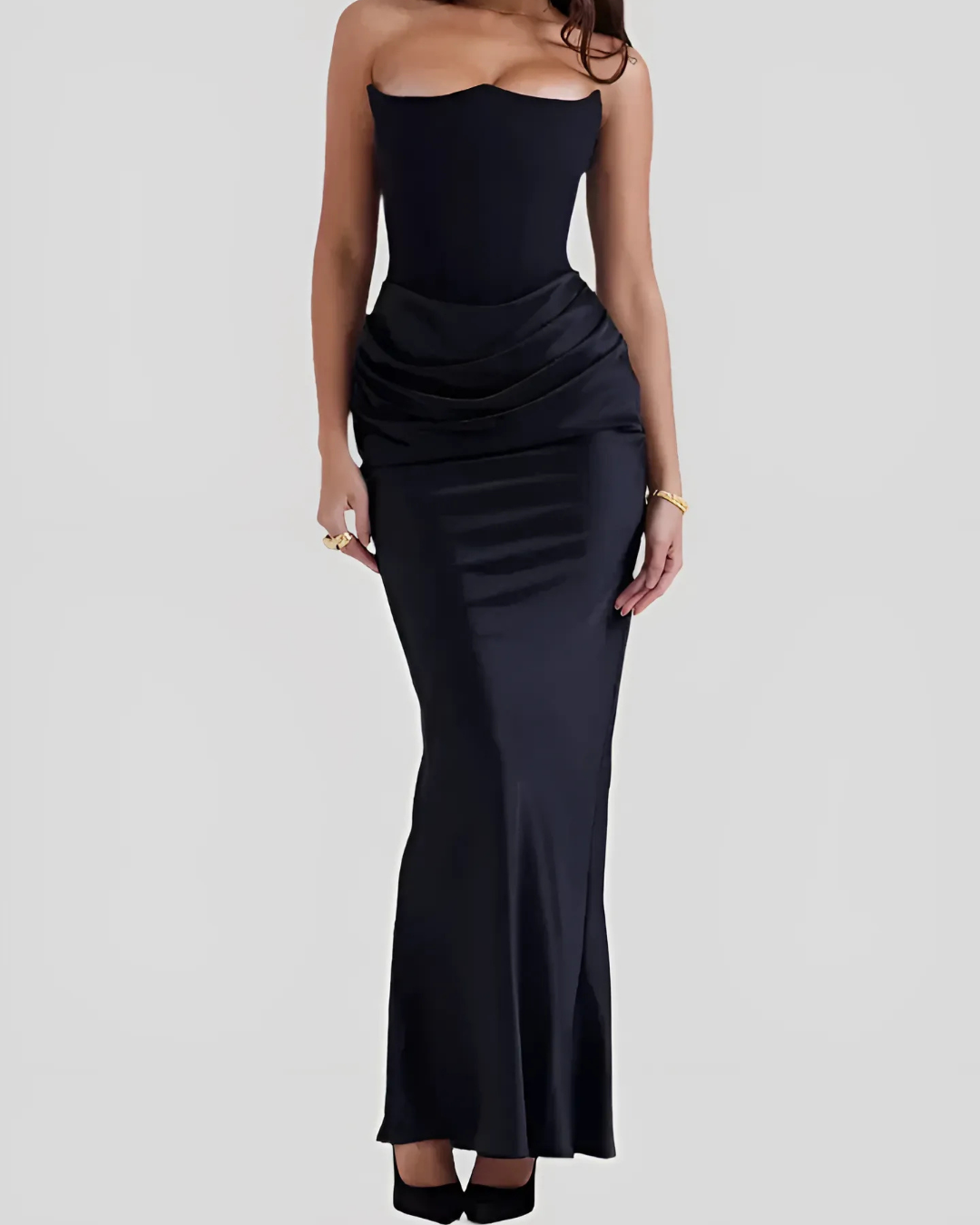 Close-up of the elegant draped detail on a women's formal maxi dress, ideal for evening events or as a wedding guest.