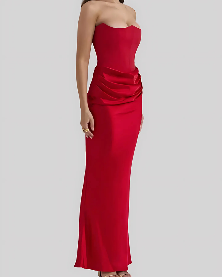 Formal women's evening dress, a draped maxi style, offering an elegant and sophisticated look for wedding guests.