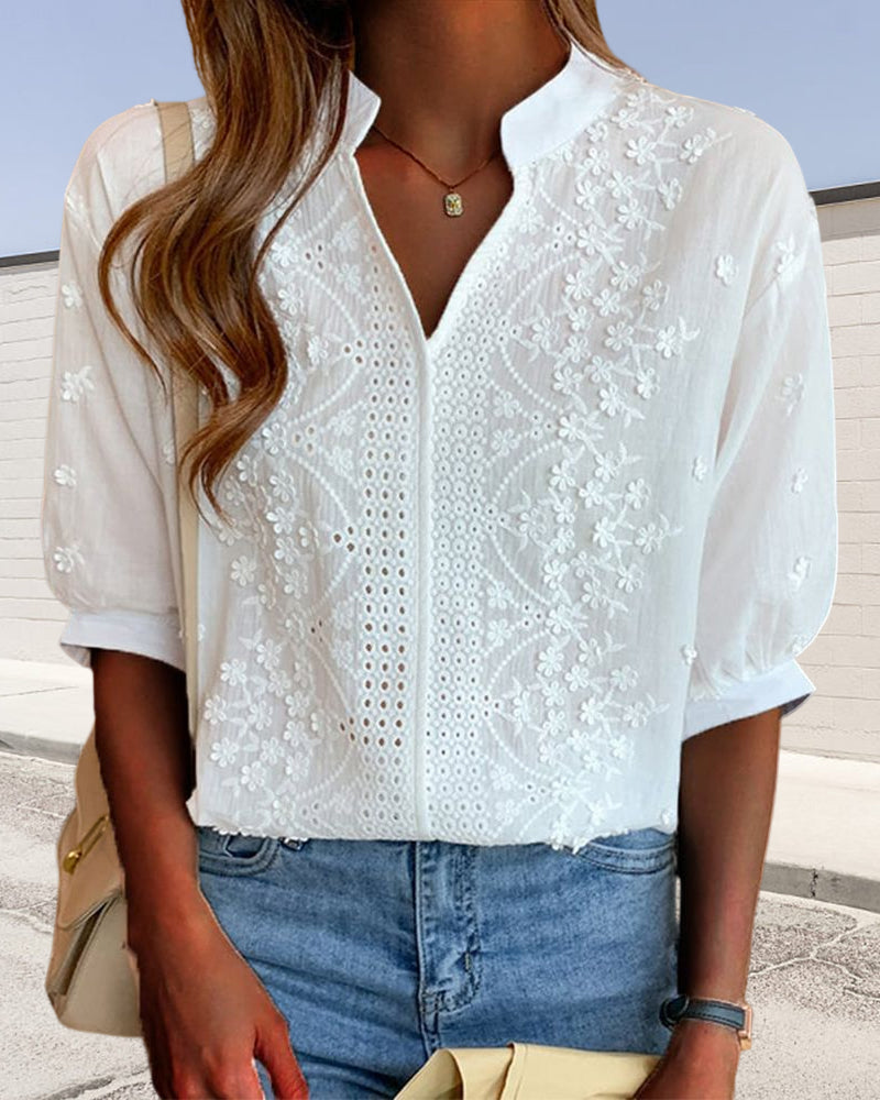 Elegant women's embroidered mandarin collar blouse with puff sleeves & floral details for spring/summer fashion.