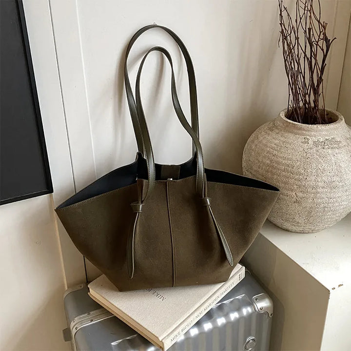 Luxury look women's faux suede tote handbag, designed for elegance and practical daily use.