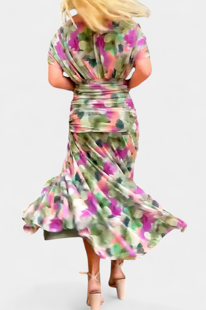 Stylish women's floral maxi dress at an indoor party. An elegant evening gown with a captivating flowy design.